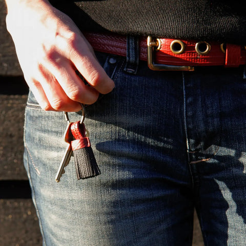 Sustainable tassel key chain, ethically made by Elvis & Kresse from recycled materials