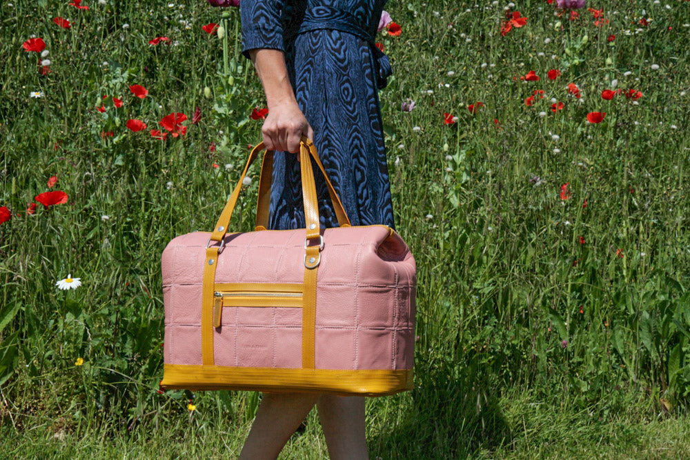 Sustainable luxury duffel bag by Elvis & Kresse