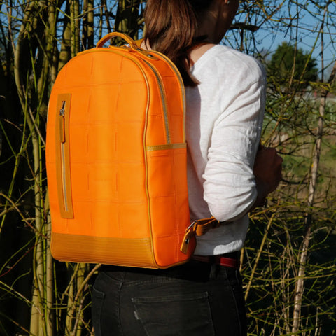The Elvis & Kresse Voyager Backpack made from rescued leather and genuine decommissioned fire-hose
