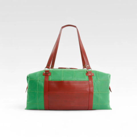 Elvis & Kresse Weekend Bag, sustainably made from upcycled Rolls Royce leather and recycled London Fire Brigade fire-hose