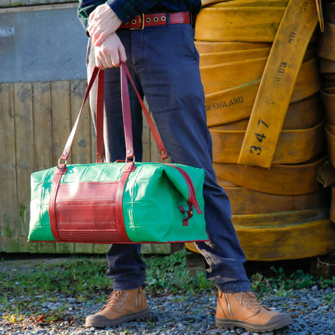 eco-friendly luxury leather duffel bag made from rescued materials