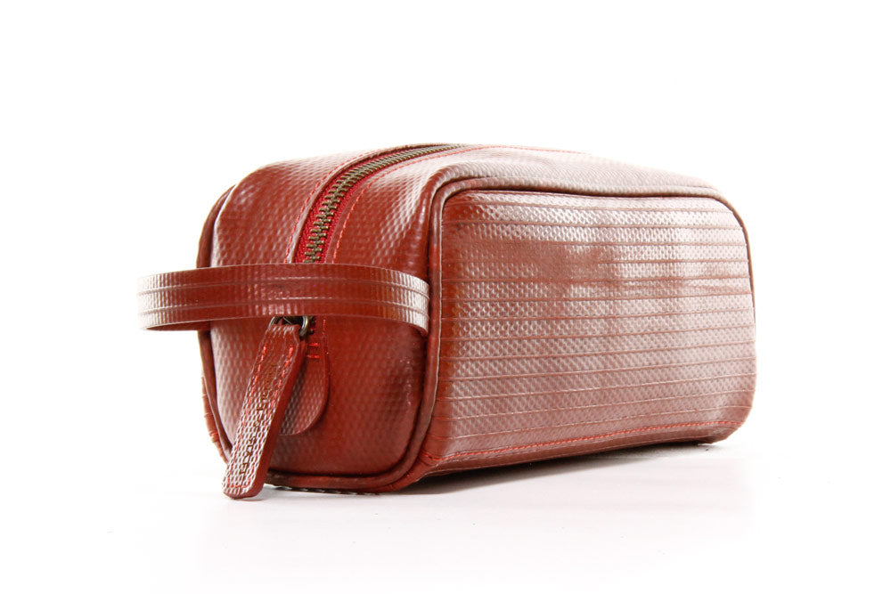 Travel Case by Elvis & Kresse made from decommissioned fire-hose