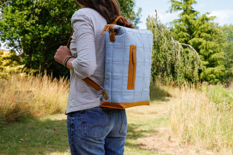 Sustainable leather back pack by Elvis & Kresse, made from rescued Rolls Royce leather and decommissioned London fire-hose