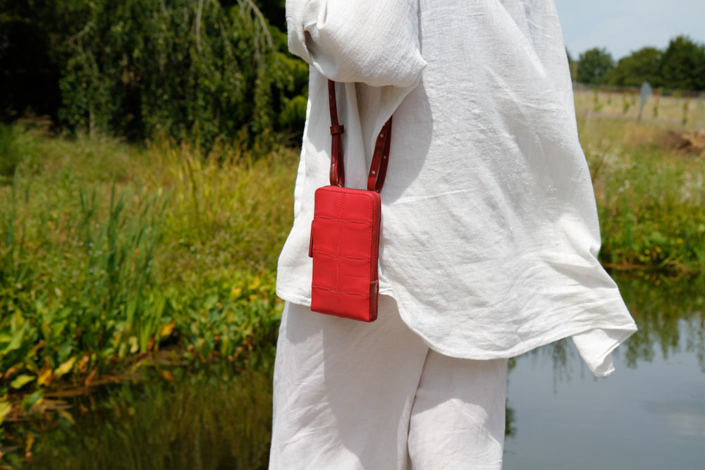 Sustainable leather phone bag by Elvis & Kresse