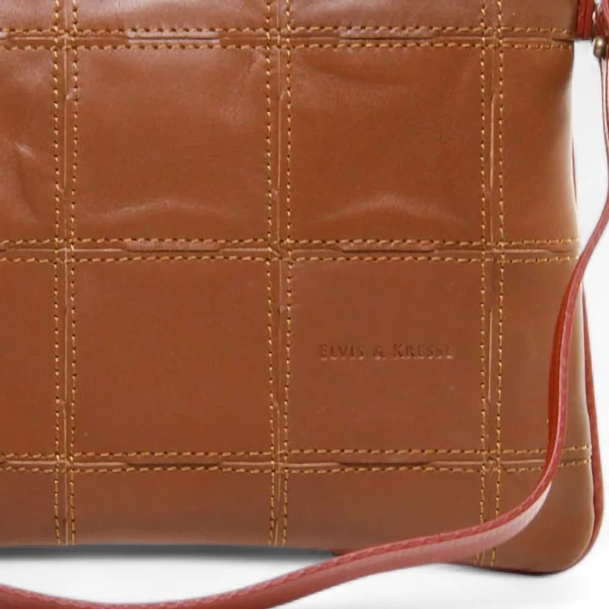 Fire_Hide_Clutch_Cognac_1_web-detail_72550d3b-0dc8-4c2f-bc78-89669589f77f.webp
