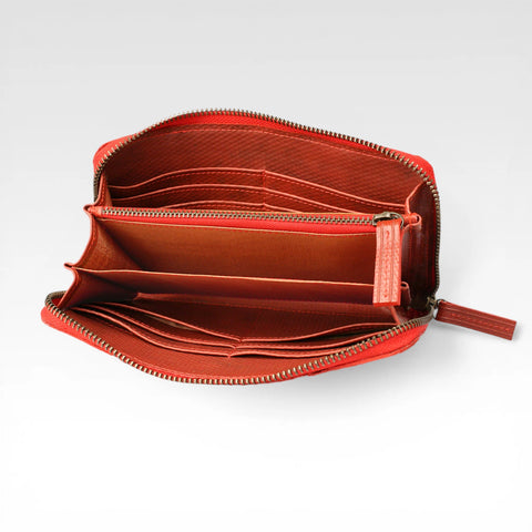eco-friendly vegan leather purse made from rescued materials with a rescued parachute lining