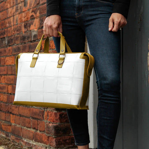 Elvis & Kresse Metropolitan Bag, sustainably made from upcycled Rolls Royce leather  and recycled London Fire Brigade fire-hose