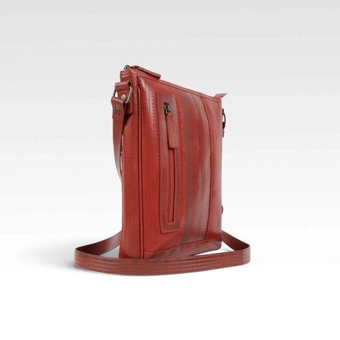 The Elvis & Kresse Reporter Bag, available in red recycled fire-hose