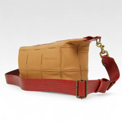 The Elvis & Kresse Boho Bag, available in fawn upcycled leather and red recycled fire-hose