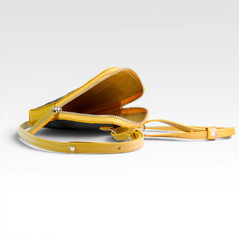 The Elvis & Kresse Crossbody Pouch has a rescued parachute lining