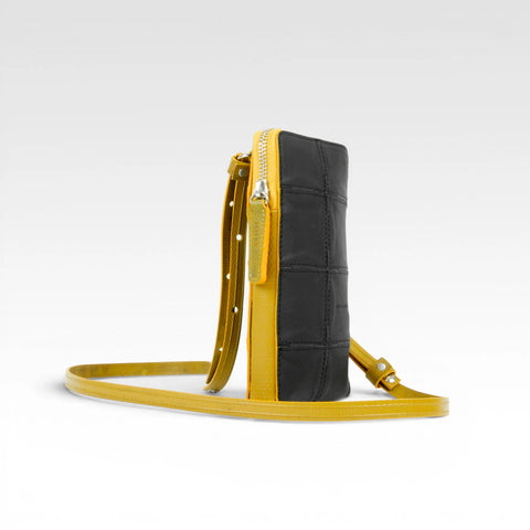 Elvis & Kresse Crossbody Pouch is an ethical and sustainable small crossbody bag: carry phone, wallet and other essentials