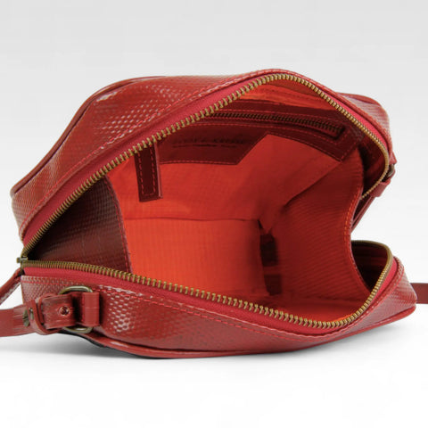 The Elvis & Kresse Crossbody Pouch has a rescued parachute lining