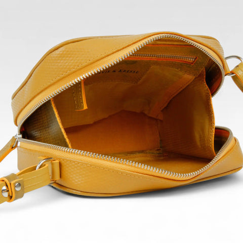 The Elvis & Kresse Crossbody Pouch has a rescued parachute lining