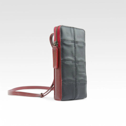 Elvis & Kresse Crossbody Pouch is an ethical and sustainable small crossbody bag: carry phone, wallet and other essentials