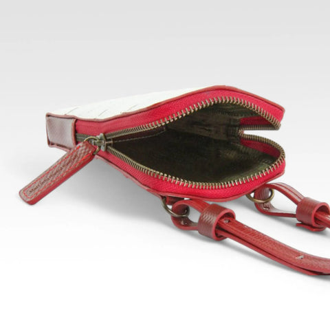 The Elvis & Kresse Crossbody Pouch has a rescued parachute lining