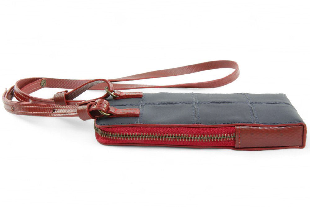 Sustainable leather phone bag by Elvis & Kresse