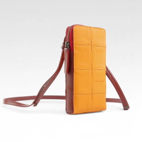 Elvis & Kresse Crossbody Pouch is an ethical and sustainable small crossbody bag: carry phone, wallet and other essentials