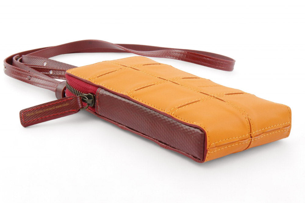 Sustainable leather phone bag by Elvis & Kresse