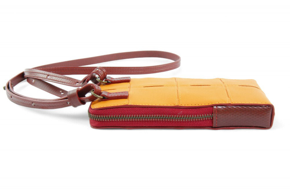 Sustainable leather phone bag by Elvis & Kresse