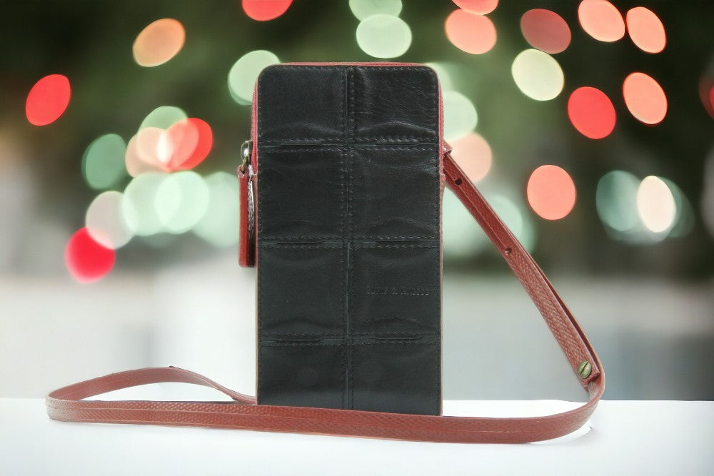 Sustainable leather phone bag by Elvis & Kresse