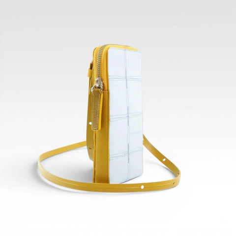 Elvis & Kresse Crossbody Pouch is an ethical and sustainable small crossbody bag: carry phone, wallet and other essentials