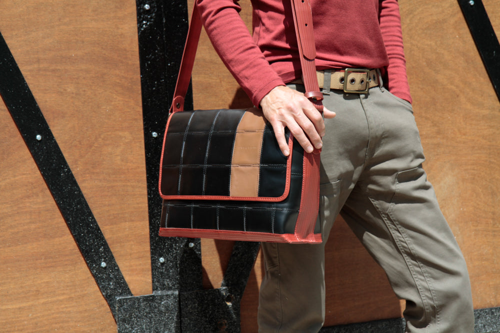 Sustainable luxury messenger bag by Elvis & Kresse