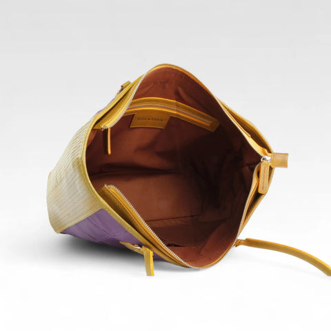 eco-friendly, sustainable leather tote bag made from low carbon materials with a rescued cotton lining
