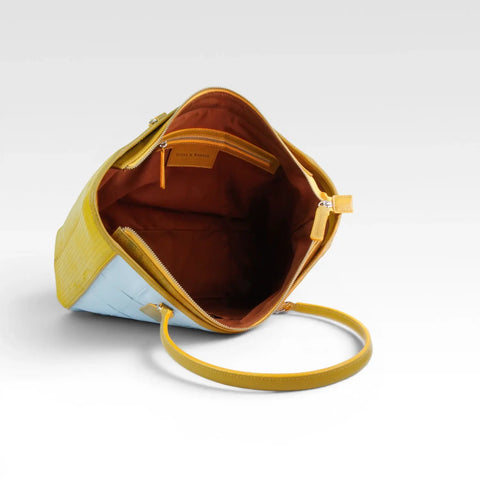 eco-friendly, sustainable leather tote bag made from low carbon materials with a rescued cotton lining