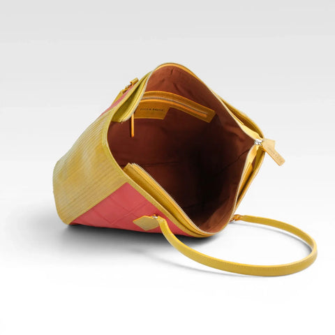 eco-friendly, sustainable leather tote bag made from low carbon materials with a rescued cotton lining