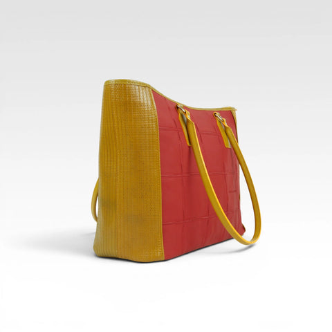The Elvis & Kresse Classic Tote Bag, available in purple upcycled leather and yellow recycled fire-hose