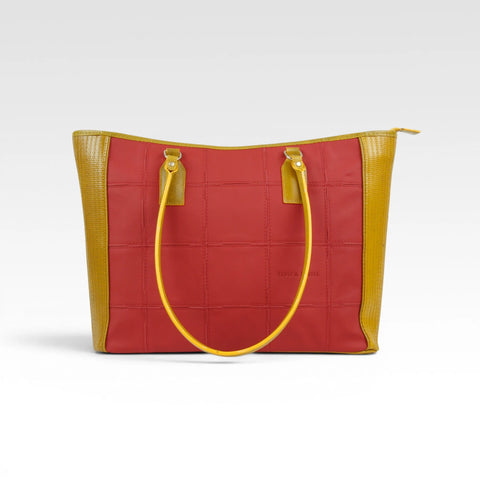 The Elvis & Kresse Classic Tote Bag, available in purple upcycled leather and yellow recycled fire-hose