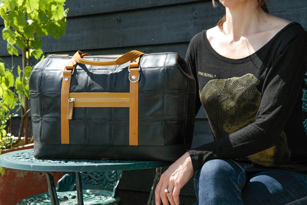 Sustainable luxury duffel bag by Elvis & Kresse