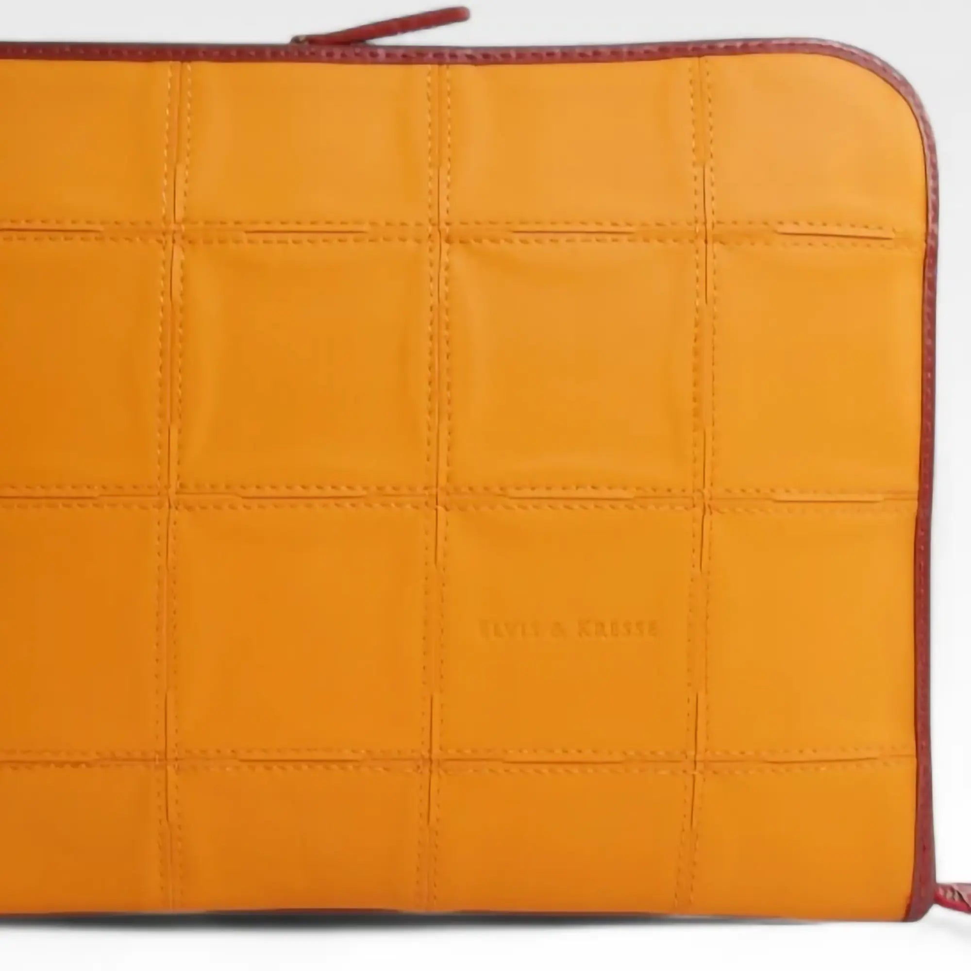folio-laptop-case-fire-hide-orange-1-details_77a229fc-eb89-4f5c-b227-ea9b029f494e.webp
