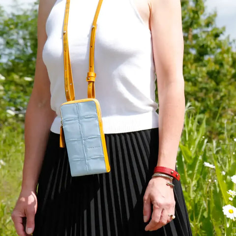 made from hand-woven leather upcycled from Rolls Royce and genuine decommissioned fire-hose rescued from London Fire Brigade
