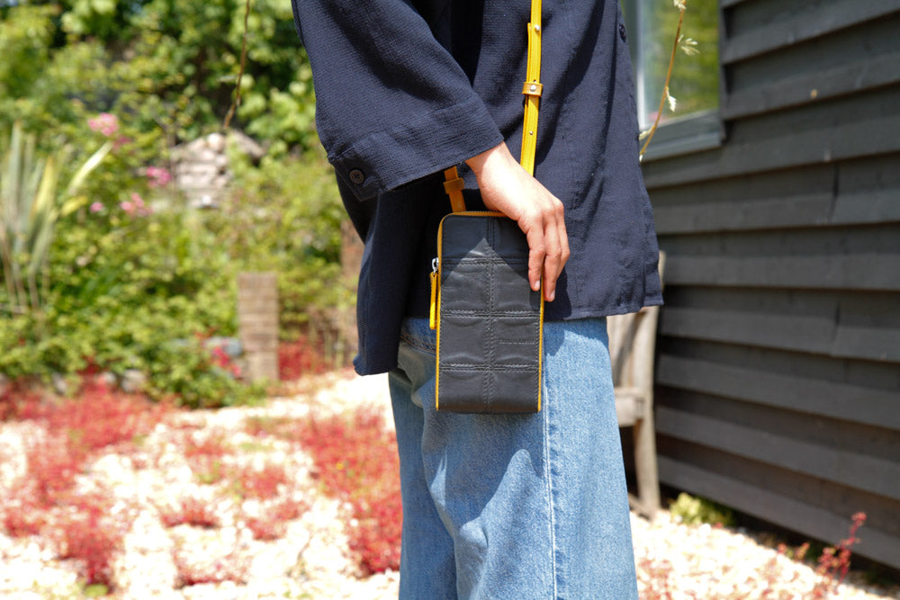 Leather phone pouch by Elvis & Kresse
