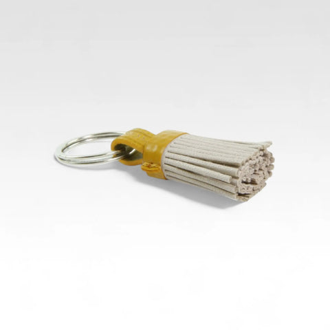 The Elvis & Kresse Mini Tassel Keyring made from rescued leather and genuine decommissioned fire-hose