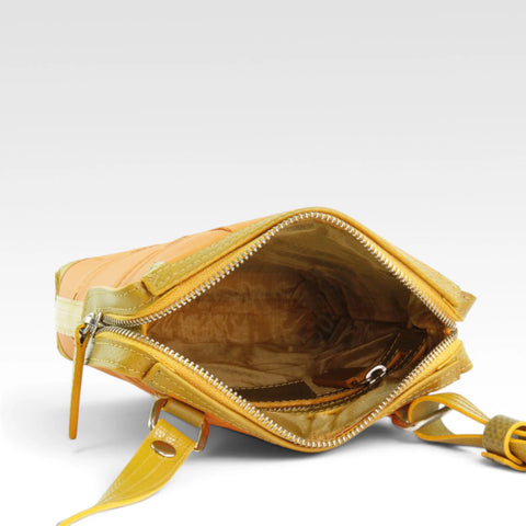 The Elvis & Kresse Saddle Bag has a rescued parachute lining