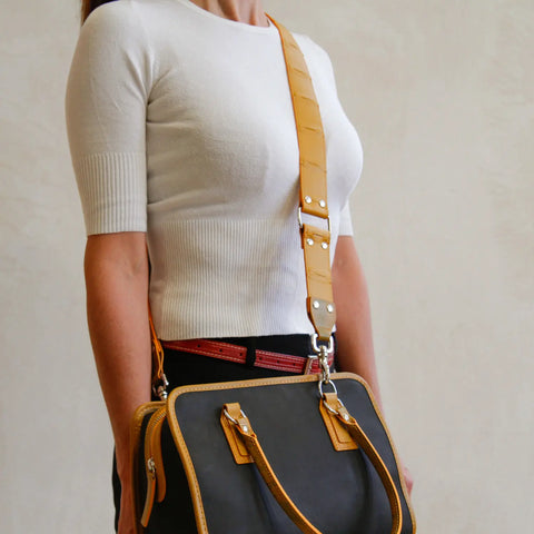The Elvis & Kresse Leather Shoulder Strap made from rescued leather and decommissioned fire-hose