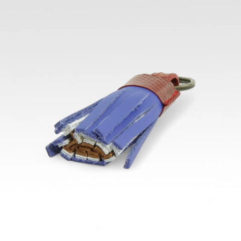 Sustainable tassel key chain, ethically made by Elvis & Kresse from recycled materials