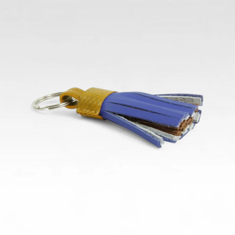 Sustainable tassel key chain, ethically made by Elvis & Kresse from recycled materials