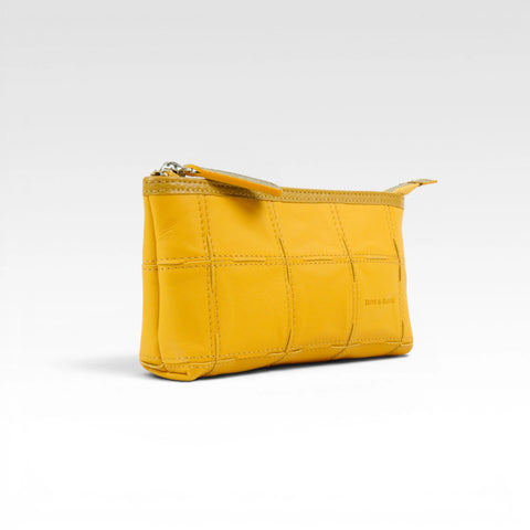 Sustainable toiletry bag, ethically made by Elvis & Kresse from recycled materials