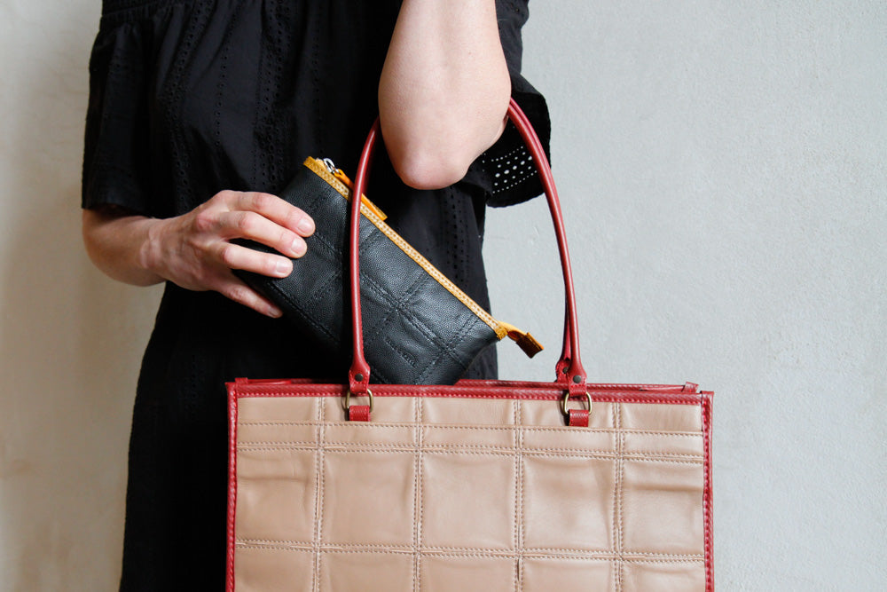 upcycled leather toiletry pouch