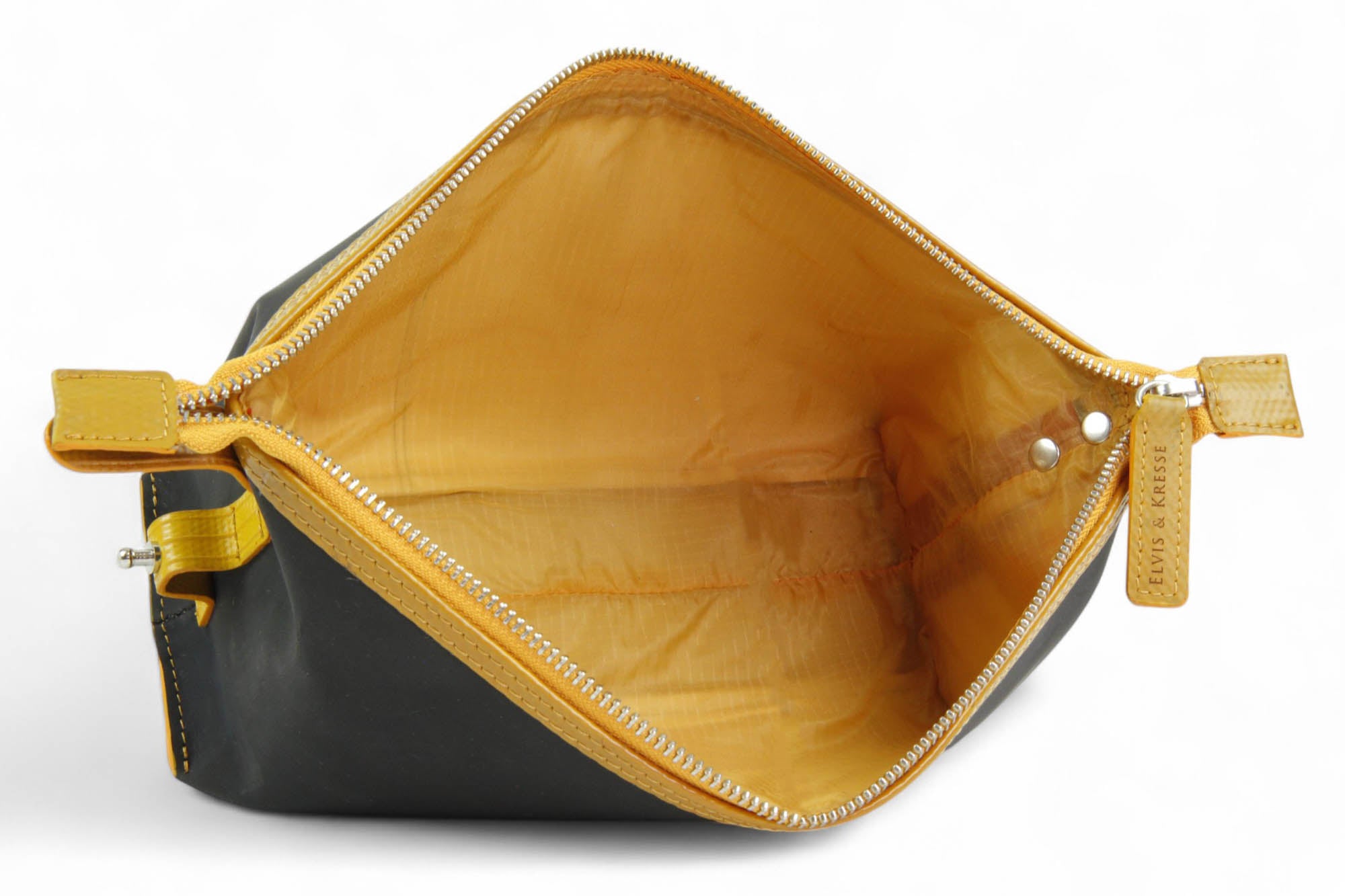 Sustainable toiletry bag made from reclaimed printing blanket and parachute silk lining
