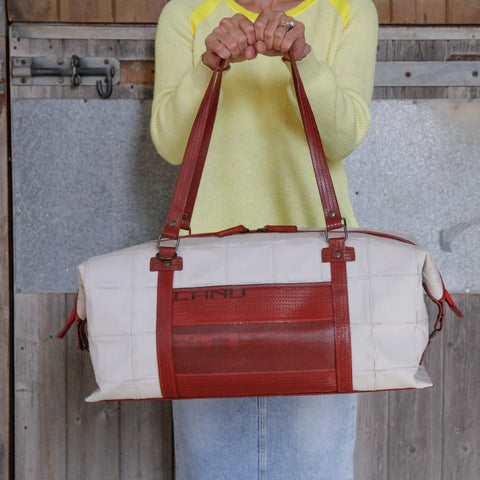 eco-friendly luxury leather duffel bag made from rescued materials