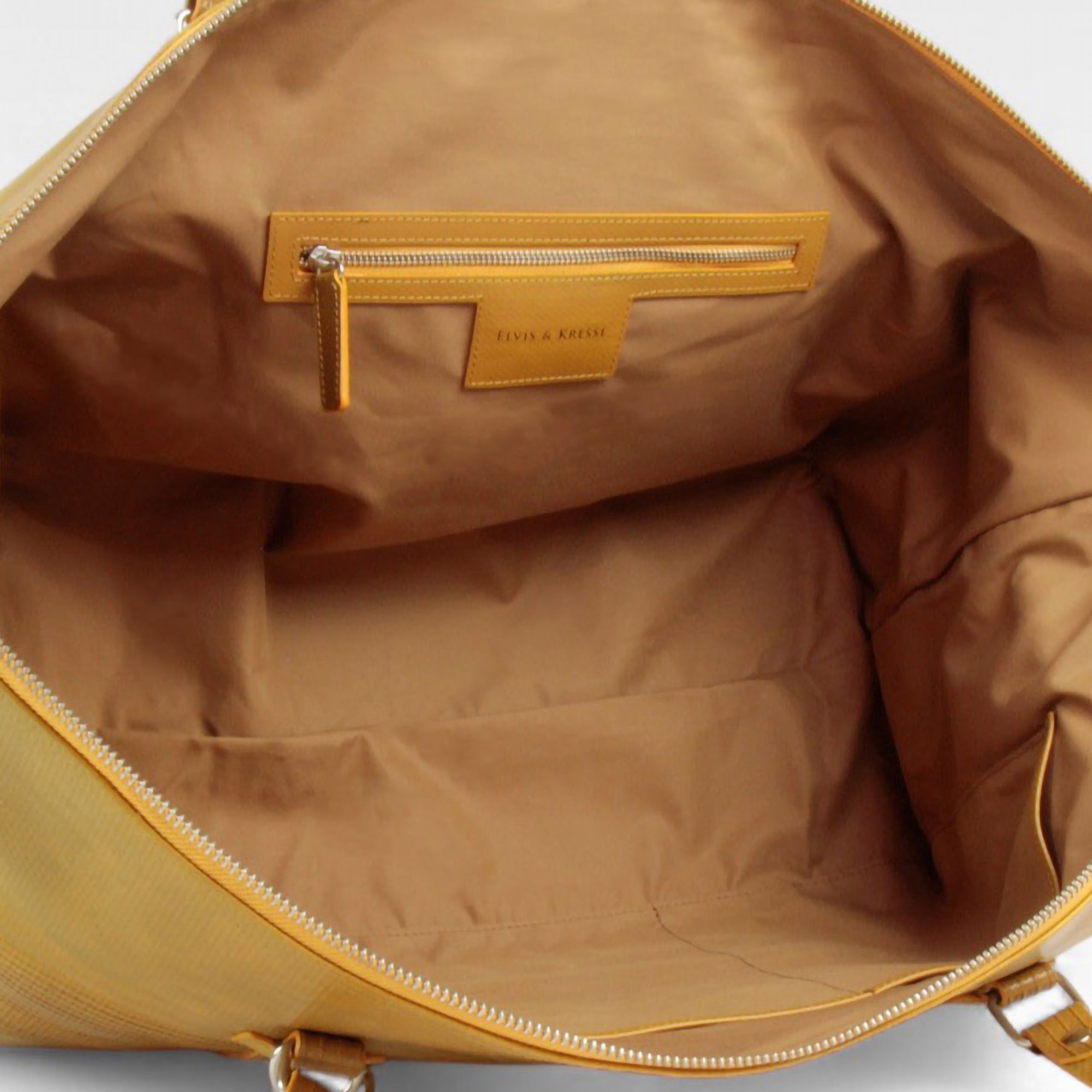 weekend-bag-yellow-tan-lining-detail_015ac065-89bf-4d3c-a439-6f6d7f931e4f.jpg