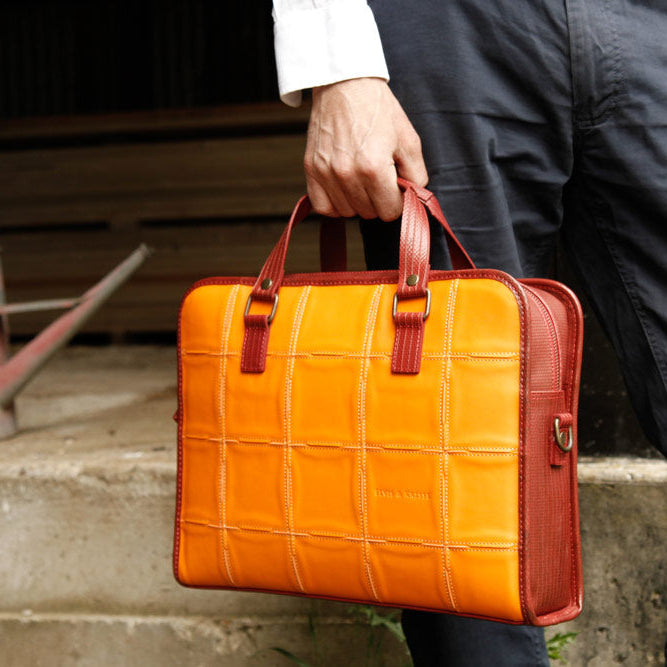 Recycled leather briefcase by Elvis & Kresse