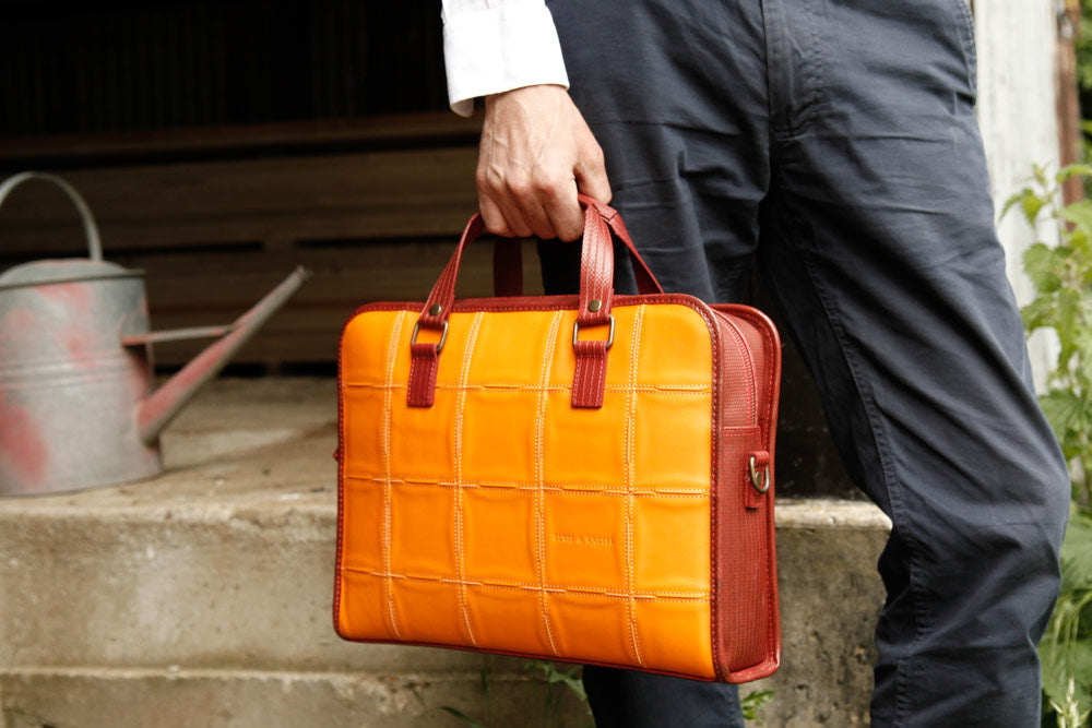 Recycled leather briefcase by Elvis & Kresse