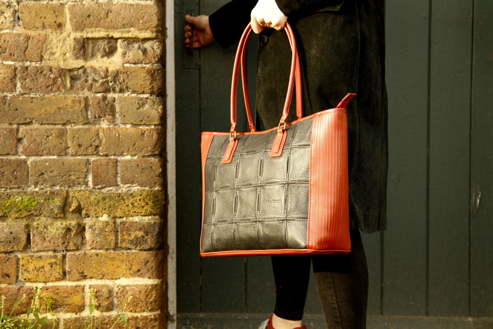 Recycled leather and decommissioned fire-hose tote bag